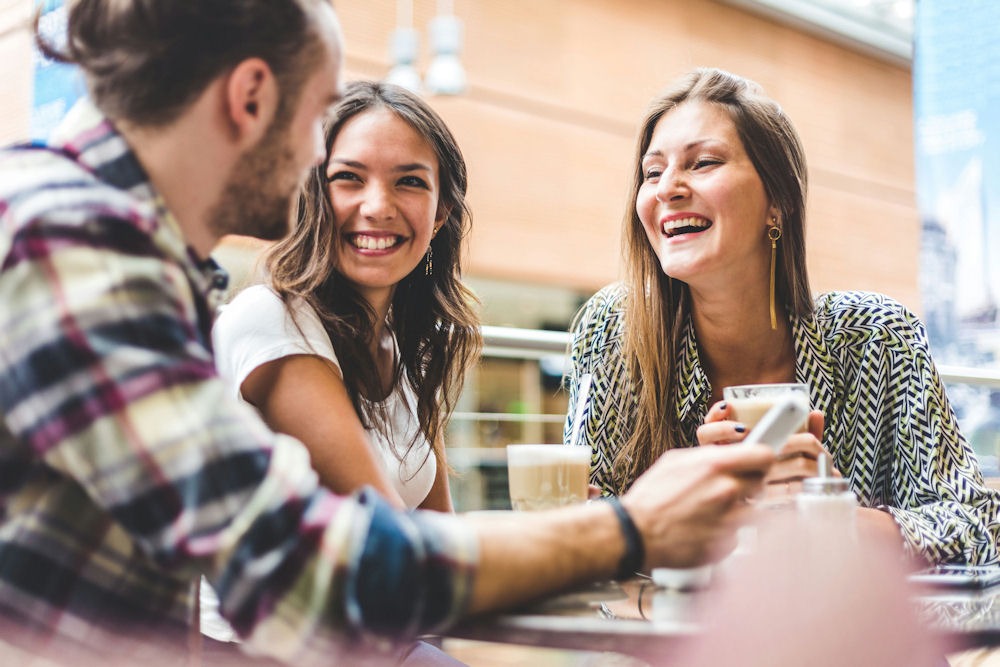 Friends showing unity and encouragement, demonstrating how to help a friend with addiction
