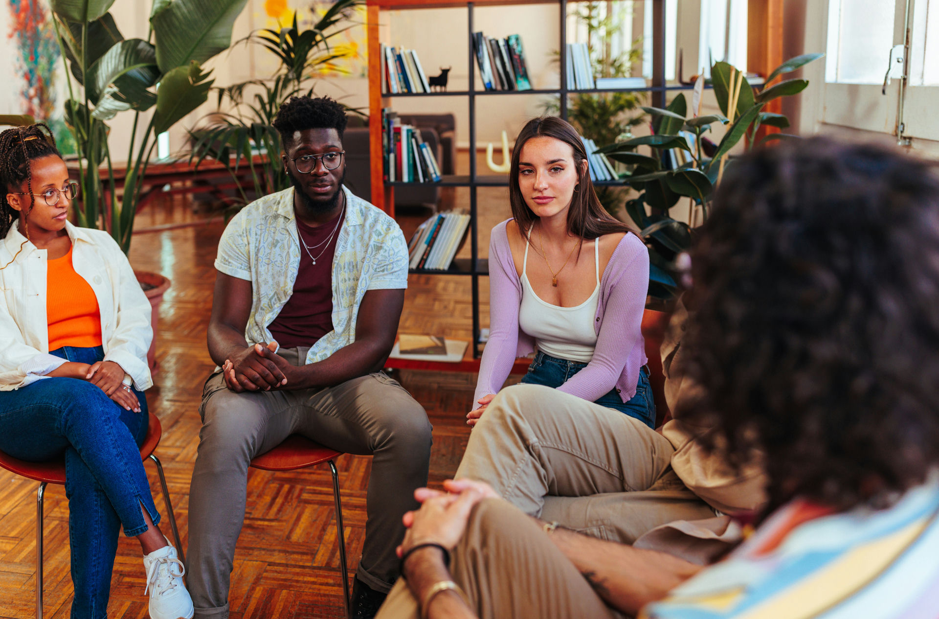 group session discussing healthy coping mechanisms